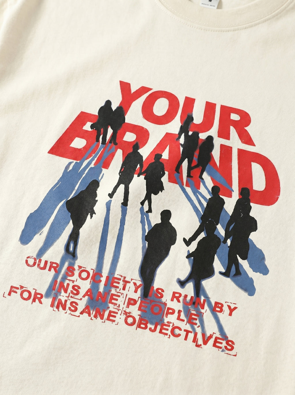 White t-shirt with graphic design of silhouettes and text on a white background